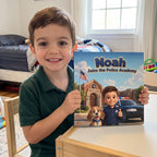 Your Child Joins the Police Academy – A child smiling with their personalized book