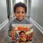 Your Child the Brave Firefighter – A child smiling with their personalized book