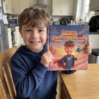 Your Child Becomes a Superhero – A child smiling with their personalized book